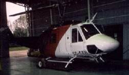 A White and Red Color painted Helicopter