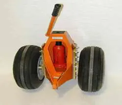 Orange Color Painted Component With Wheels on a White Background