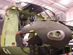 The Hull of a Helicopter in Grey Color in a Work Station