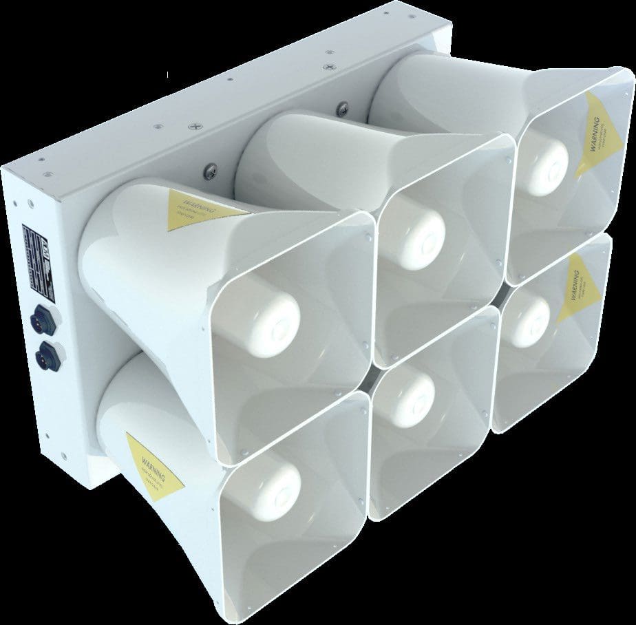 A group of white speakers sitting in a row.